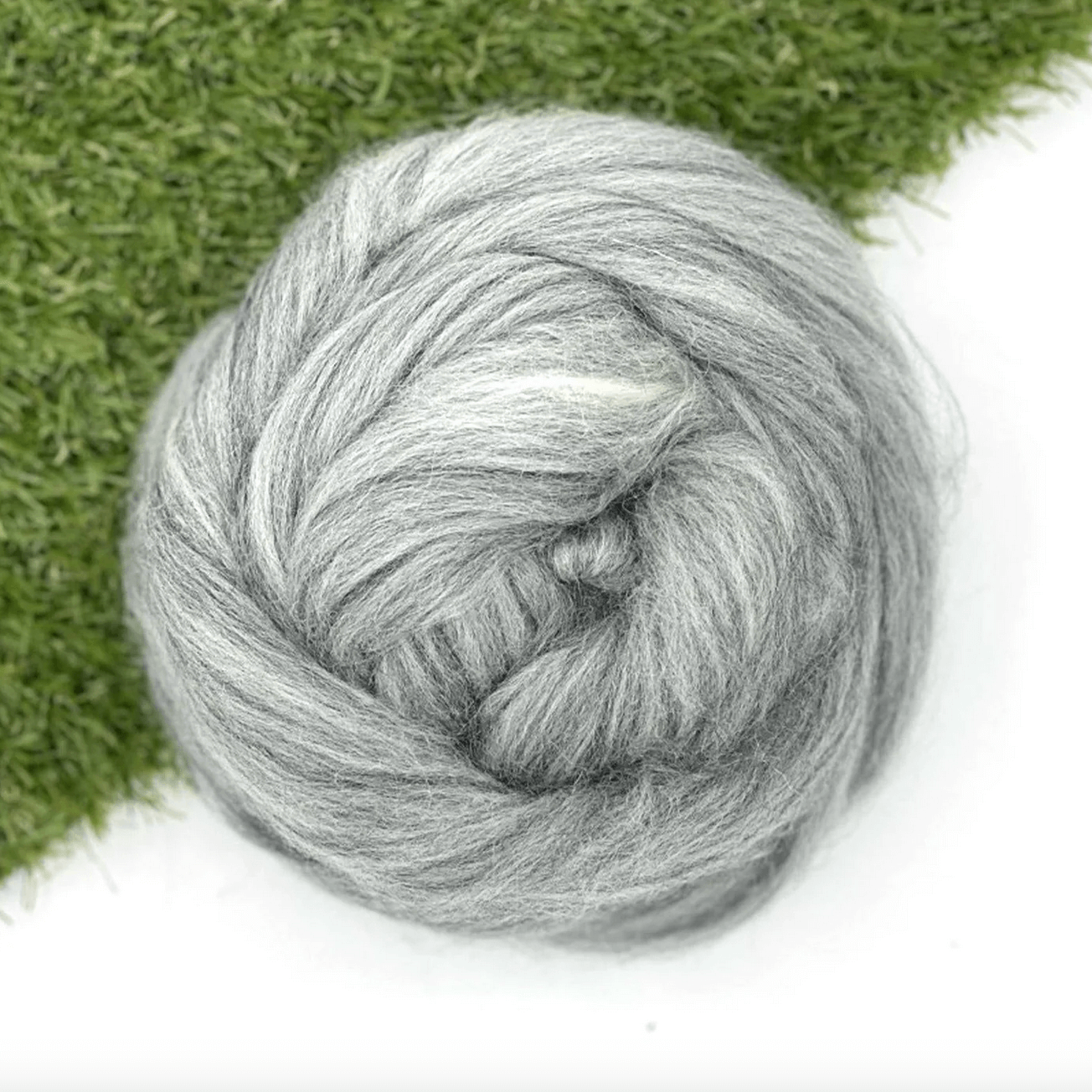 An unspun light grey BFL top for spinning, felting, dyeing, weaving
