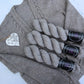 Hand dyed yarn. Light grey, semi solid, hand dyed yarn on Merino Silk Yak fingering weight 4 ply yarn.