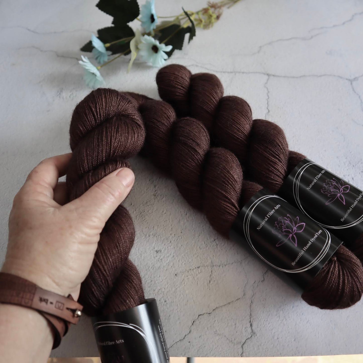 Hand dyed yarn. Rich saturated chocolate brown, semi solid, hand dyed yarn on Merino Silk Yak fingering weight 4 ply yarn.