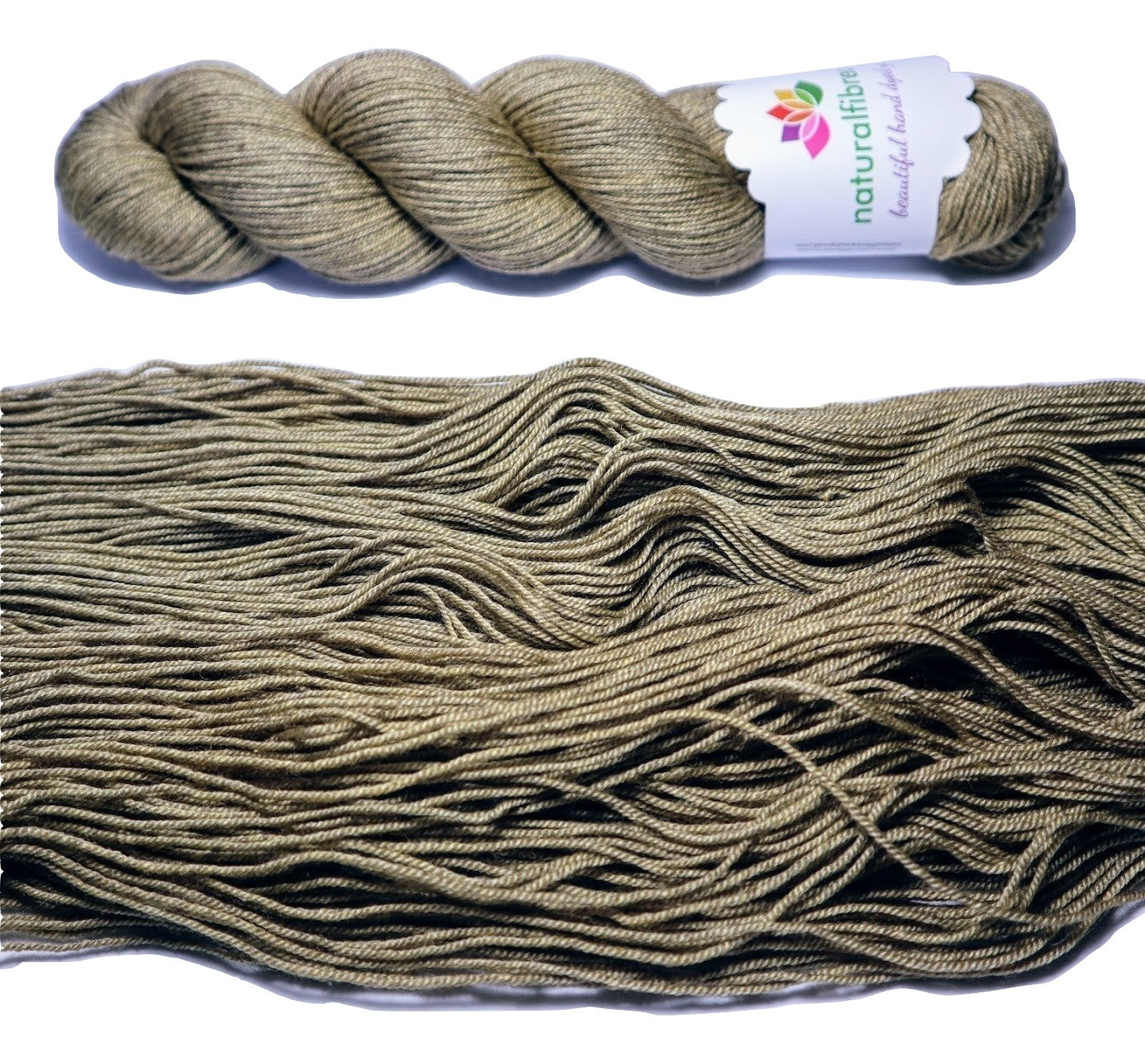 Hand dyed yarn. Pale gold, semi solid, hand dyed yarn on Merino Silk Yak fingering weight 4 ply yarn.